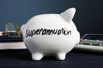 white piggy bank with Superannuation written on its side